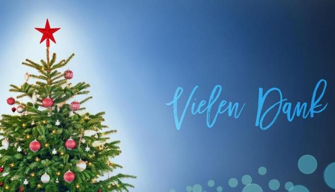 Geschmückter Weihnachtsbaum neben dem Schriftzug "Vielen Dank"